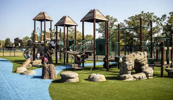 Recreational zone with children's play area, outdoor games and community spaces at Prestige Mysore Road