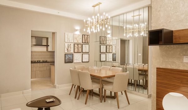 Open-plan dining area with elegant interiors at Prestige Mysore Road residential apartments, Bidadi