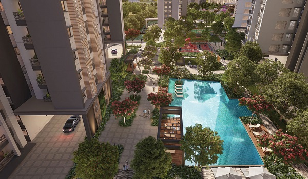 Resort-style swimming pool with deck seating at Prestige Mysore Road clubhouse, Bidadi, Bangalore